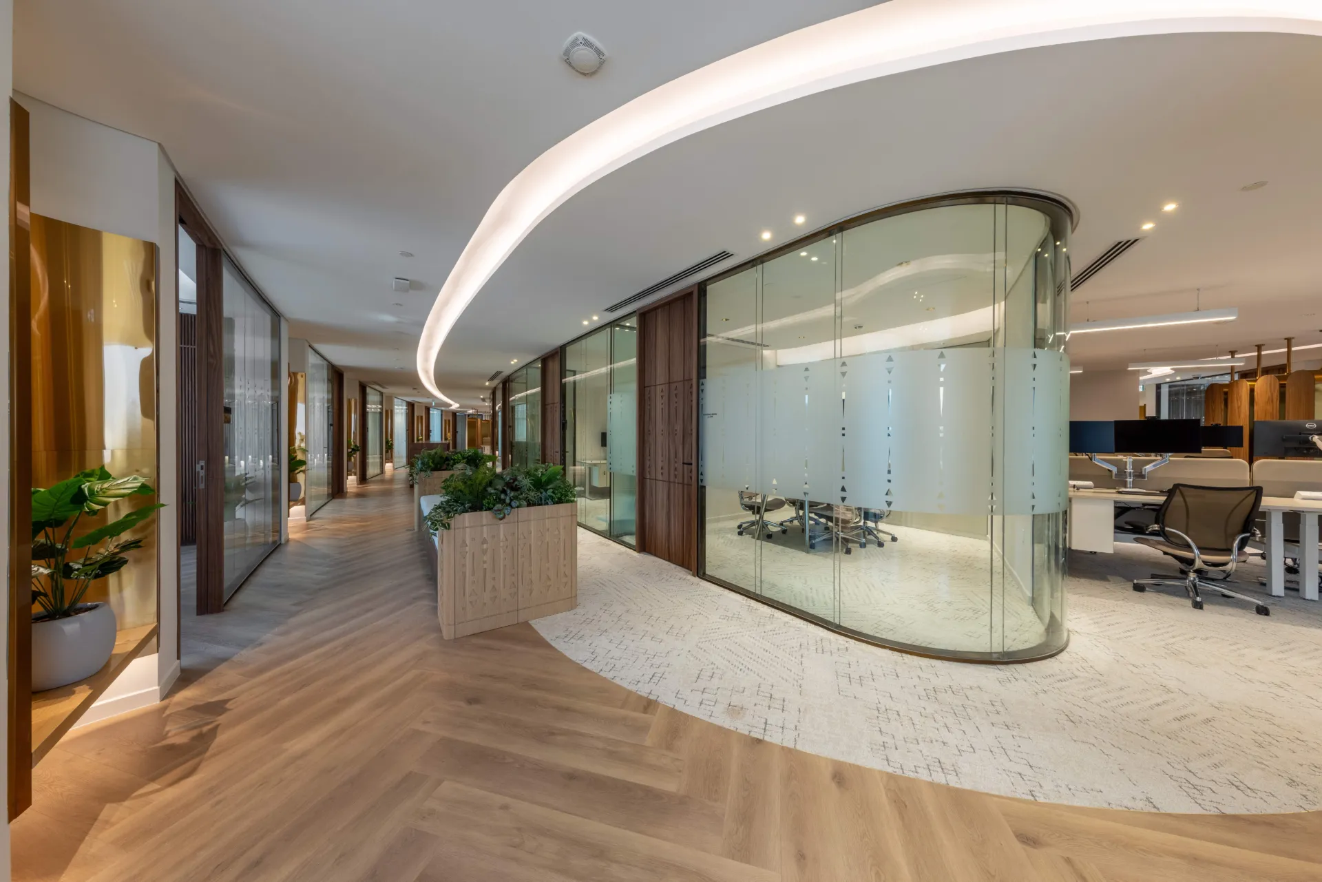 Revolution 100 curved glass meeting room and corridor